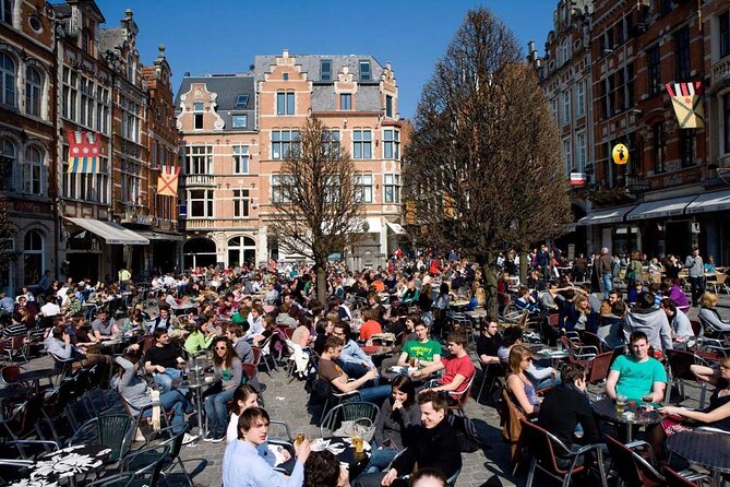 600 Years of History and Heritage: A Self-Guided Walking Tour of Leuven - Squares, schools, and a note about papal stories