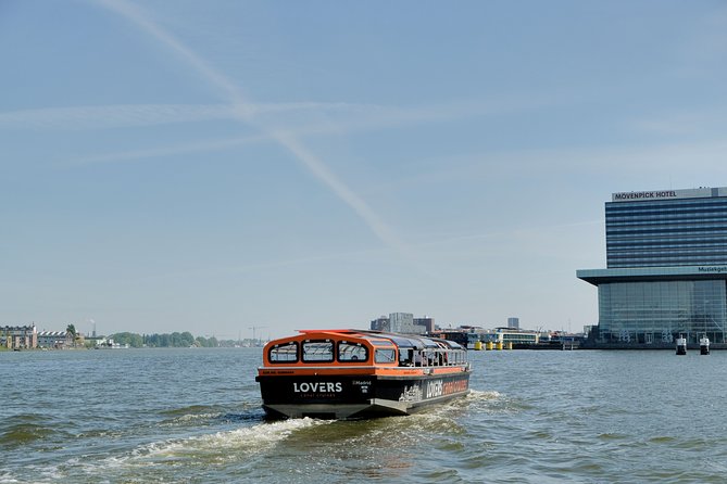 Amsterdam 1h Canal Cruise by Semi-Open Boat with Audio Guide - Comfort Tips for Semi-Open Cruising (Sun, Showers, and Noise)