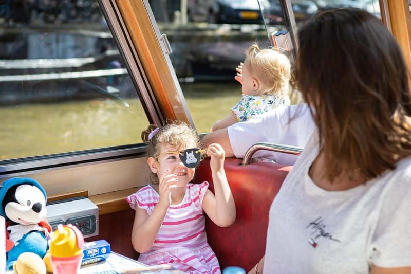 Amsterdam: 75 Minute City Canal Cruise with Audio Guide - Boarding Experience: Earphones, QR Codes, and Getting Settled