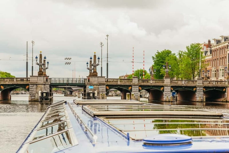 Amsterdam: 75 Minute City Canal Cruise with Audio Guide - Snackbox and the Comfort Factor on Real Amsterdam Days