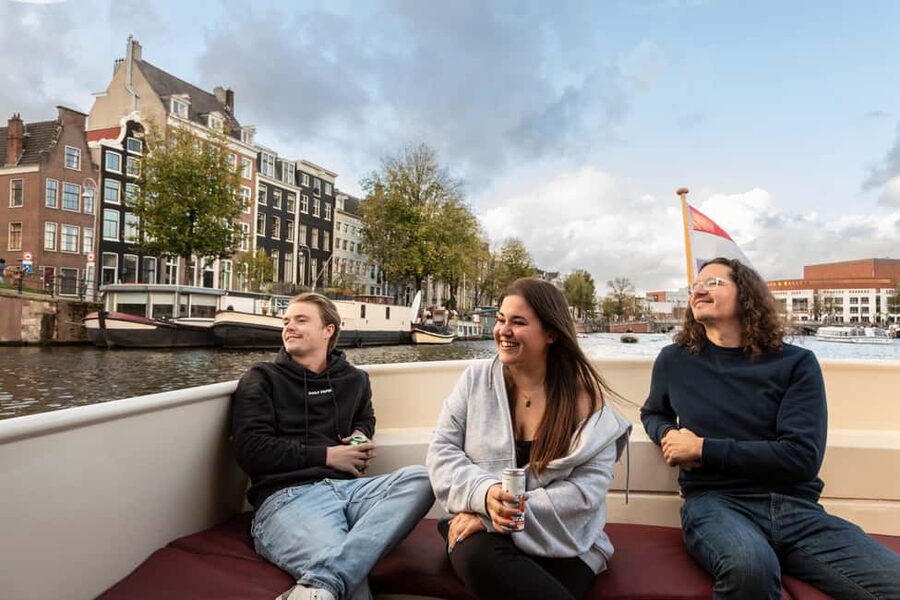 Amsterdam: Canal Cruise with Live Commentary & Audio Guide - Live commentary plus audio: how to use both without missing the best bits