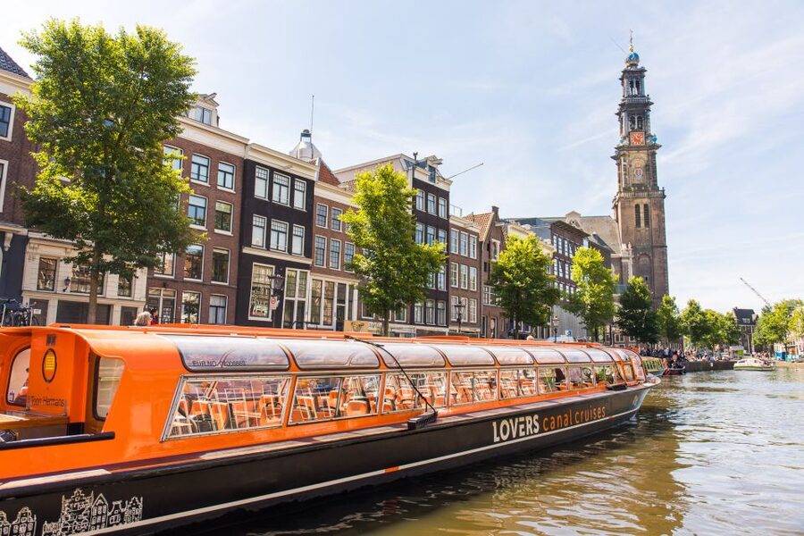Amsterdam: City Centre Canal Cruise including Audioguide - Timing reality: 1 hour on the water, up to 90 minutes total