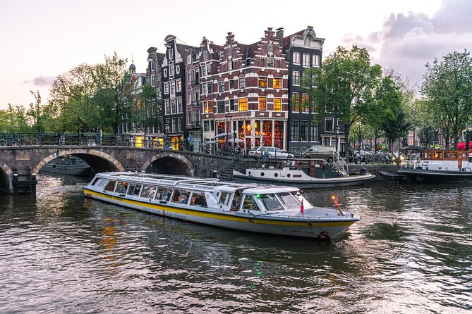 Amsterdam City Centre Cruise on heated boat with Audioguide - Audio guide reality: speakers, phone languages, and how to actually hear it