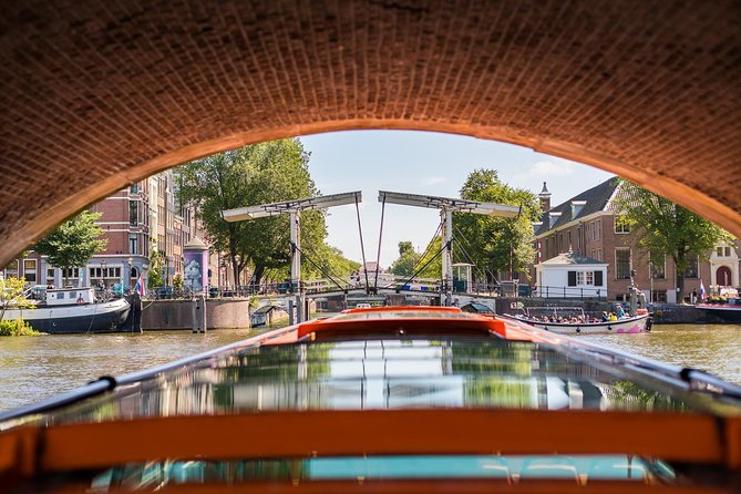 Amsterdam Sightseeing Canal Cruise with Audio Guide - More “wow” stops as you go: markets, science, maritime, and ship views