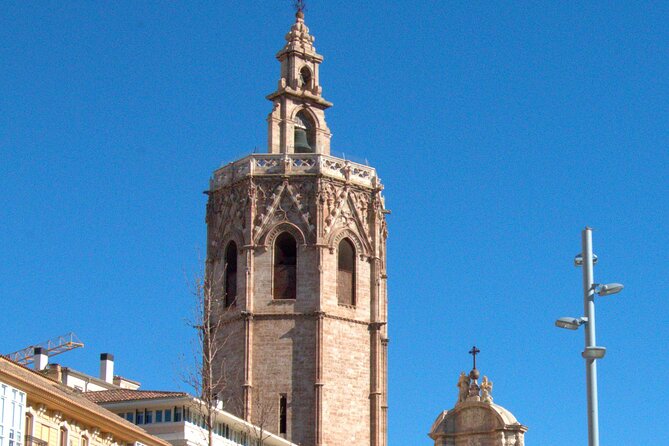 Between Two Gates: A Self-Guided Audio Tour in Valencia - Plaça de Dècim Juni Brut and more cathedral-scale attention to detail