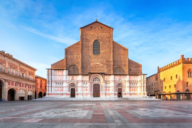 Bologna: City Walk with Audio Guide in 7 Languages on your Phone - The two medieval towers: defense, signaling, and family prestige