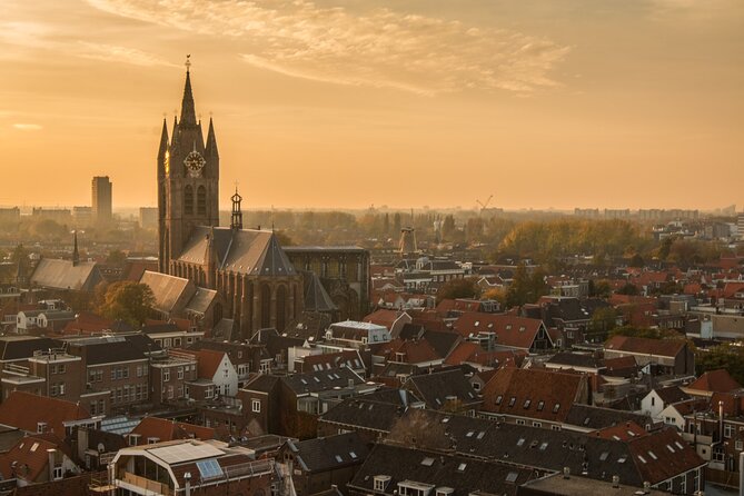 Delft: City Walk with Audio Guide in 7 Languages on your Phone - Vermeer connection and Delft blue pottery shopping on your route