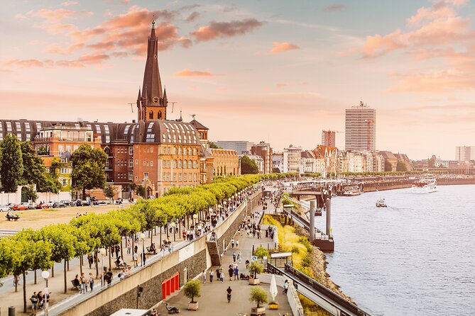 Dusseldorf: City Walk Audio Guide in 7 Languages on your Phone - Rheinuferpromenade: Where the App Turns a River Walk Into a Storyline