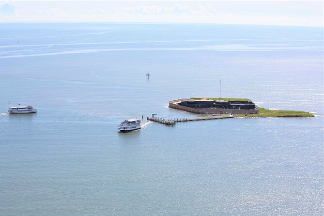 Fort Sumter Admission and Self-Guided Tour with Roundtrip Ferry - Charleston views on the way back: Rainbow Row, the Battery, and the light on the harbor