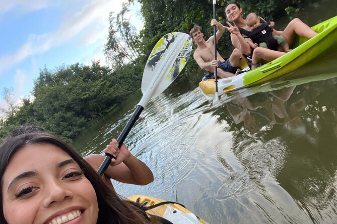 Kayaking Rainforest River on Oahu, Kahana River(Self-Guided Tour) - Kahana River scenery: calm water, lush views, and mountain backdrops