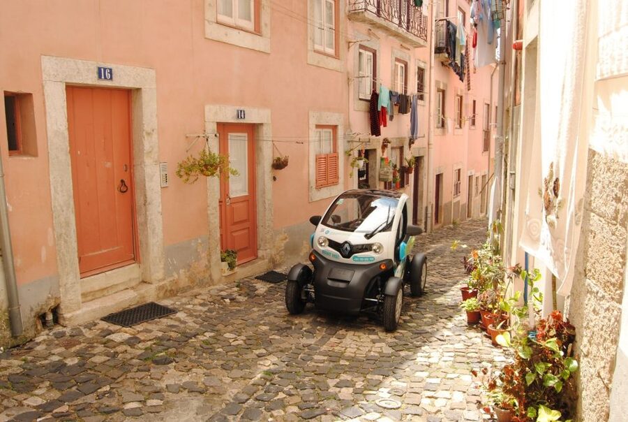Lisbon: Electric Car Moorish Tour with GPS Audio Guide - Rain, ponchos, and the best photo timing