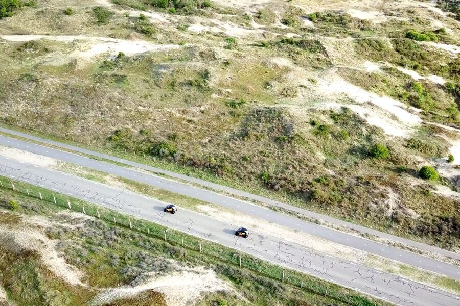 Lisse: Self-Drive Electric Car Dune and Beach Audio Tour - Audio guide facts that actually match what you’re seeing