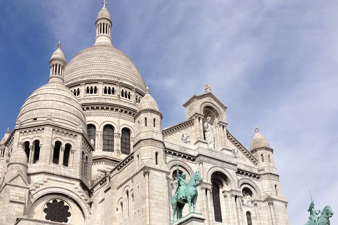 Montmartre - A Canvas of Art and History (Self-Guided audio tour) - Saint-Pierre de Montmartre: oldest-stones energy, with real schedule limits