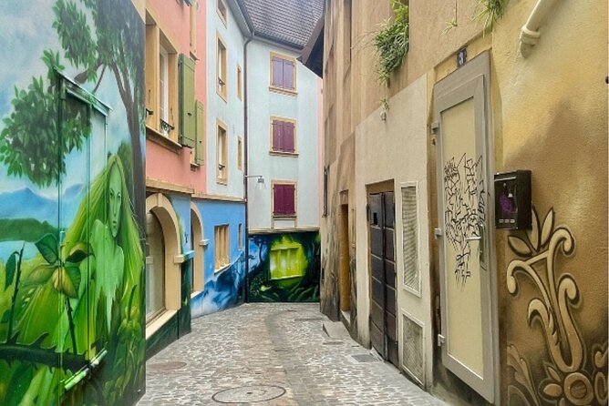 Neuchâtel Scavenger Hunt and Sights Self-Guided Private Tour - Une rue fantastique and Quai Ostervald: why these areas fit the game