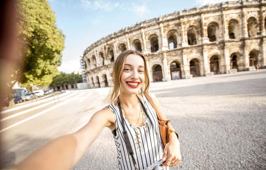Nimes: Ancient Roman Arena Ticket & Old Town Audio Tour - Stepping Into Nîmes Arena Like It’s Still in Use