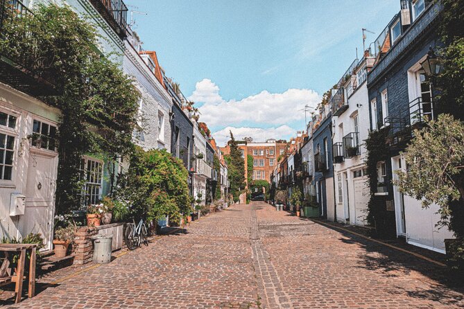 Notting Hill’s Secret Spots: A Self-Guided Walking Tour - Portobello Road market energy and a cinema with a dark past