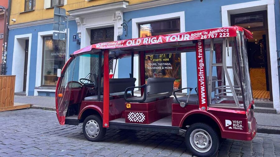 Old Riga Heated E-Bus Tour with Audio Guide & Mulled Wine - Small-group pace and the photo-stop option