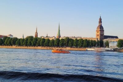 Riga Canal and Daugava Boat Tour with Welcome Drink & Audio Guide - Audio Guide Through a Speaker Plus a Welcome Drink