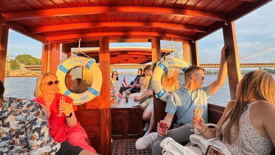 Riga: Canal Boat Tour with Welcome Drink & Audio Guide - Key highlights you’ll care about