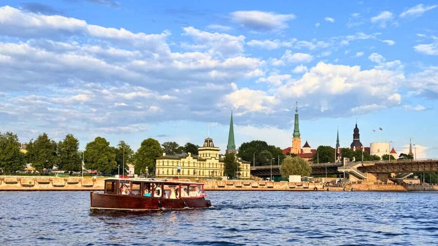 Riga: Canal Boat Tour with Welcome Drink & Audio Guide - Your route: Andrejosta to the Freedom Monument, Opera, Central Market, Riga Castle
