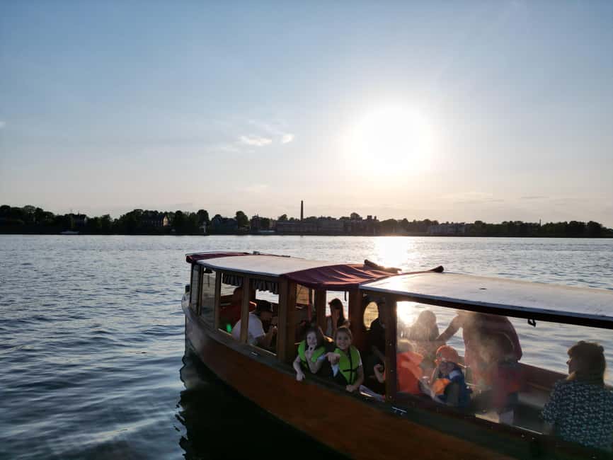 Riga: Canal Boat Tour with Welcome Drink & Audio Guide - Audio guide through boat speakers: how to hear it (and when it’s not loud enough)