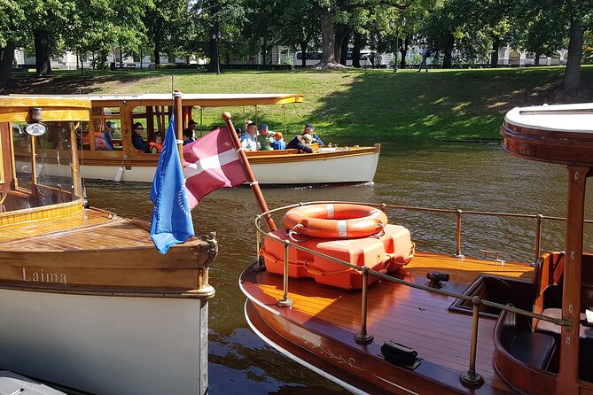 Riga City Canal & Daugava River Premium Boat Tour with Audioguide - Kronvalda Park and the Latvian National Theatre: calm canal energy