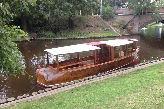 Riga: Evening or Sunset Boat Tour with Drink and Audio Guide - Key takeaways