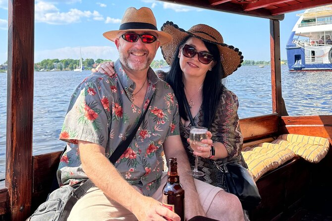 Riga: Evening or Sunset Boat Tour with Drink and Audio Guide - Leaving Riga’s Old Town for a water-level view