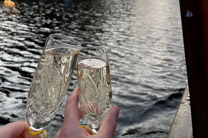 Riga: Evening or Sunset Boat Tour with Drink and Audio Guide - Boarding at Andrejosta Marina: how to get there from Old Town