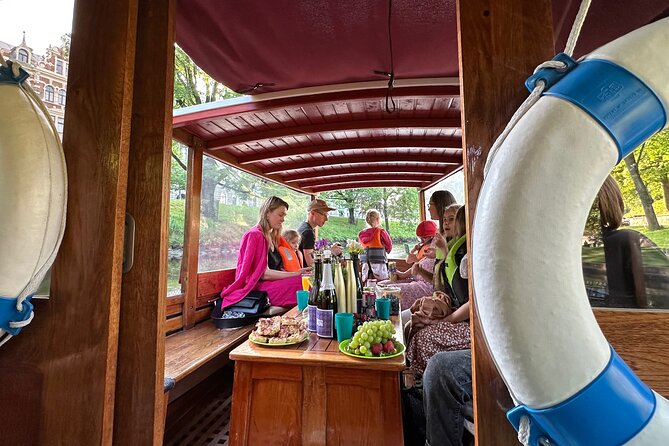 Riga: Evening or Sunset Boat Tour with Drink and Audio Guide - What you’ll see: bridges, landmarks, and the TV tower