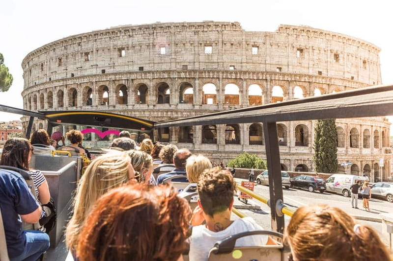 Rome: Hop-on Hop-off Sightseeing Bus Tour with Audioguide - What the bus is like: roof, seats, and the real-world comfort check