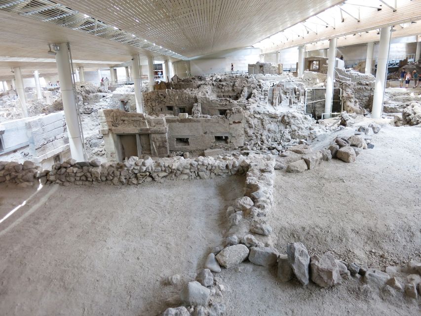 Santorini: Akrotiri Ticket with Optional Self-Guided Audios - Inside the shelter: raised routes, preserved buildings, and suspended walkways