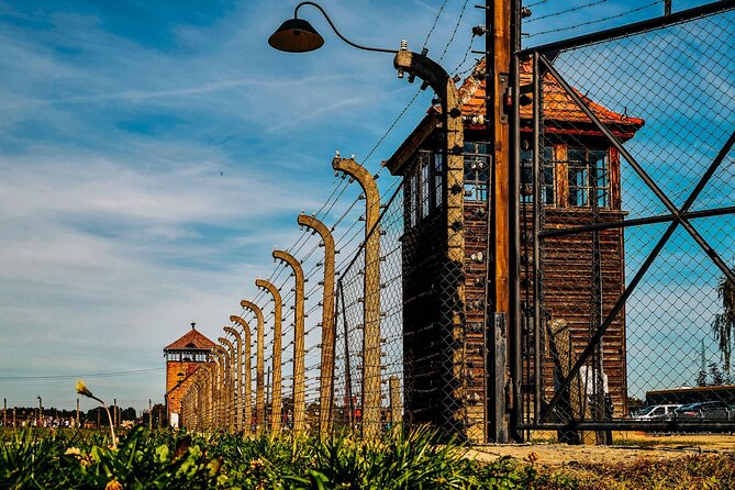 Self-Guided Tour of Auschwitz-Birkenau Museum with Transportation - Auschwitz I with headset audio: walking through the gate and into the main camp