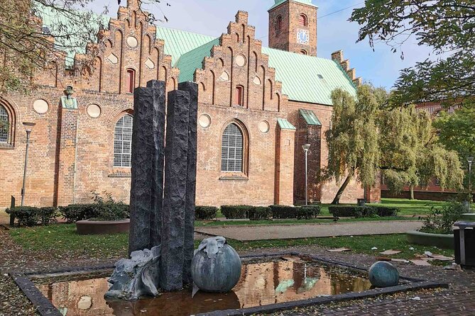 The Ancient Viking Stronghold of Aros: A Self-Guided Audio Tour in Aarhus - Aros Aarhus Kunstmuseum Pass-By and Den Gamle By’s Living Past