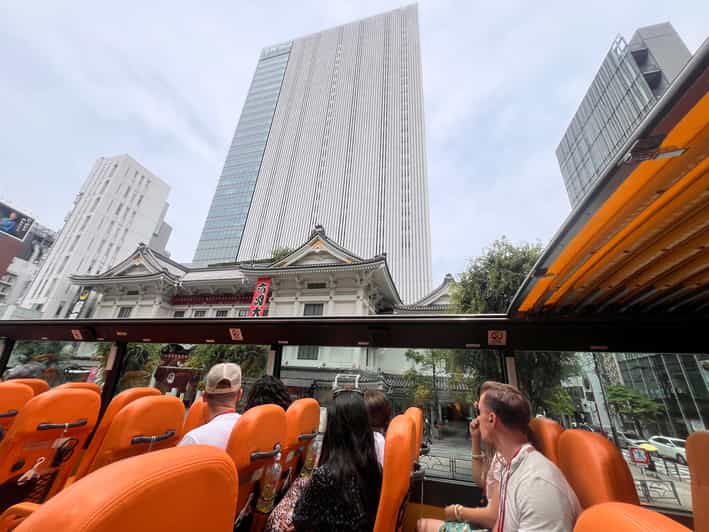 Tokyo: 60min Panoramic Open Top Bus Tour with Audio Guide - Getting On the Bus: Tokyo Station Makes It Easy