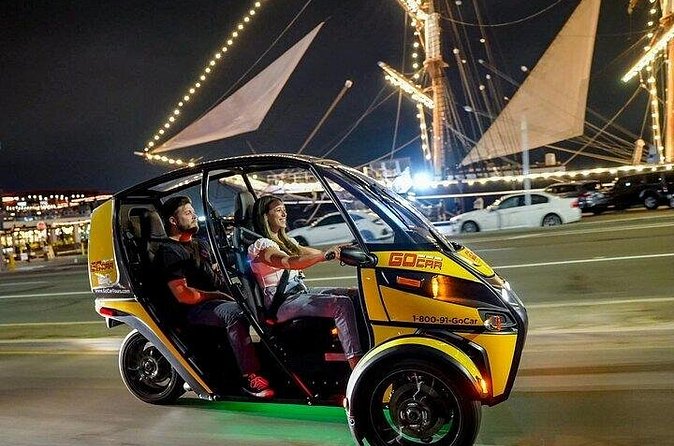 Viator Exclusive GoCar After Dark: Self-Guided Tour of Gaslamp and Balboa Park - USS Midway at night: a landmark that actually works in low light