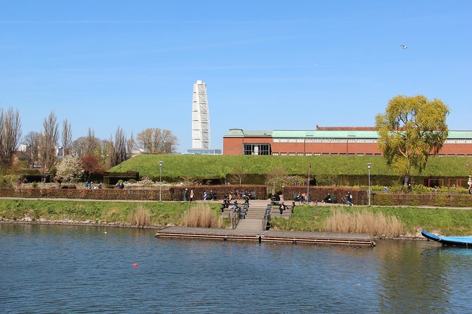 Walk Malmö with an audio guide - Folkets Park to Mollevangstorget: parks, people, and the evening vibe