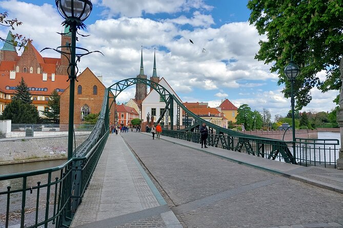 Wrocław’s Old Town: A Self-Guided History Tour - Ossolineum Institute and Market Hall: Culture Preservation to Shopping Under One Roof