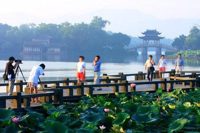 Wuzhen Water Town Self-Guided Tour with Private Transfer from Hangzhou - West Zha (Xizha): Ferry Time, Stone Lanes, and Bridges Over Water Markets